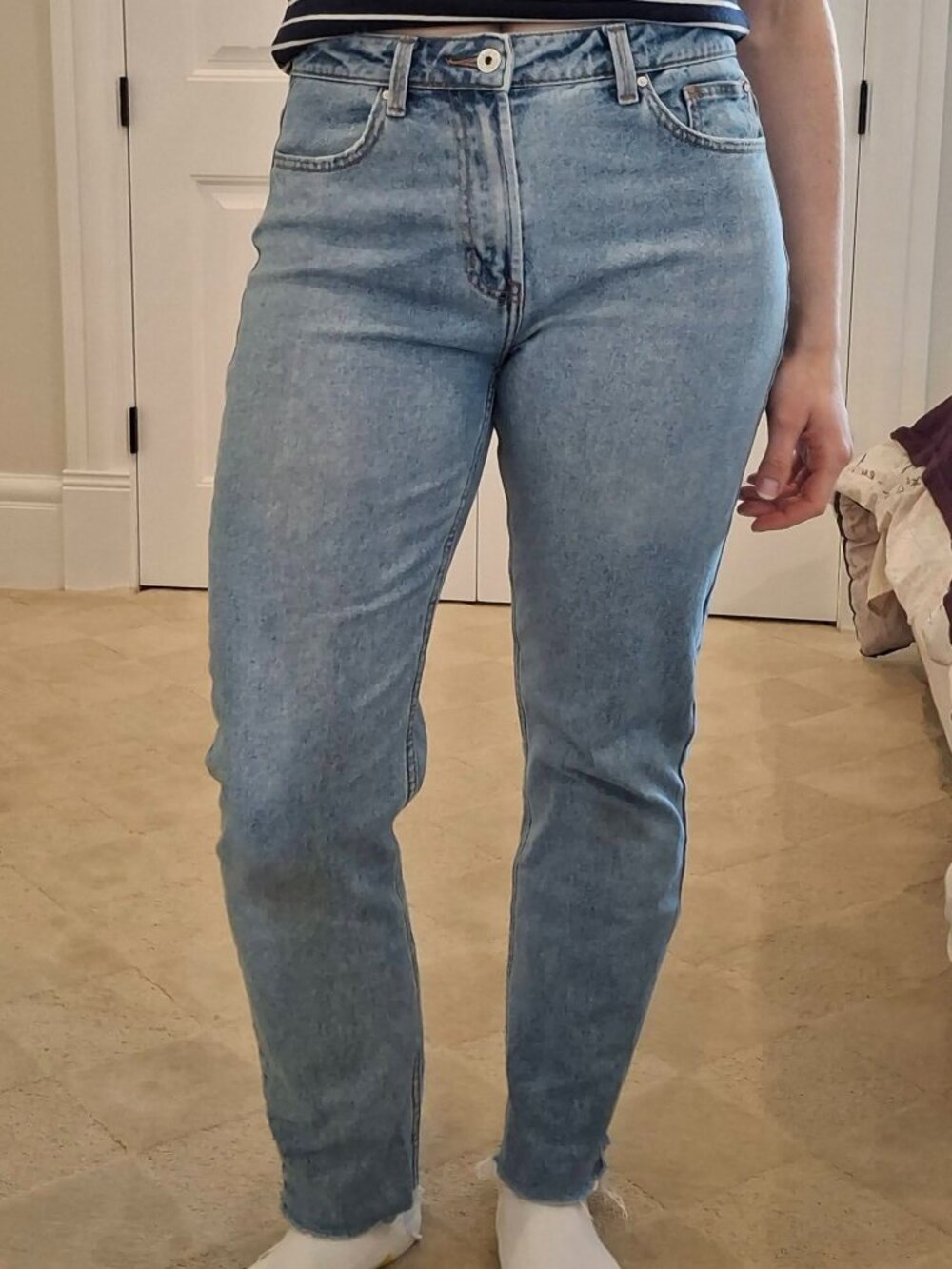 Medium-light wash mid-rise straight leg jeans